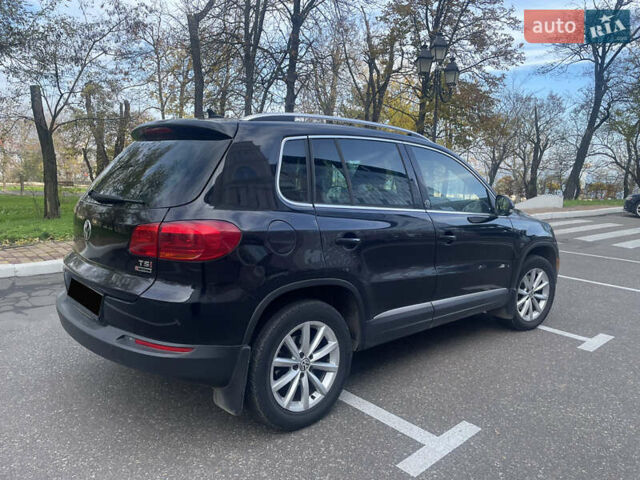 Чорний Фольксваген Тігуан, об'ємом двигуна 2 л та пробігом 180 тис. км за 14700 $, фото 2 на Automoto.ua
