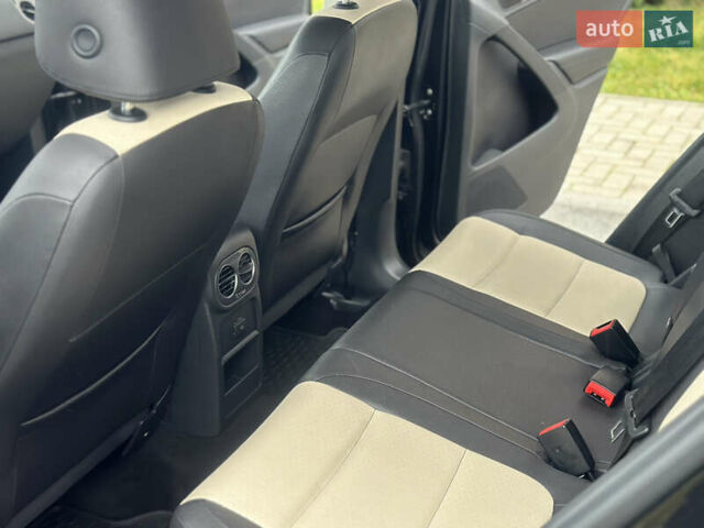 Черный Фольксваген Тигуан, объемом двигателя 2 л и пробегом 161 тыс. км за 13999 $, фото 20 на Automoto.ua