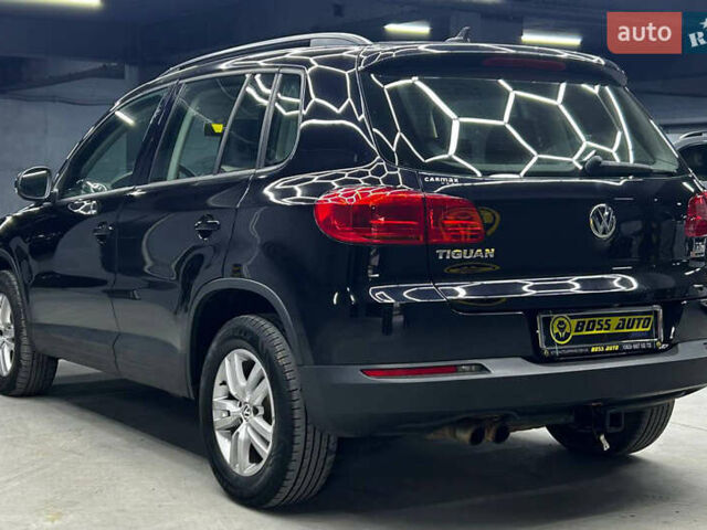 Черный Фольксваген Тигуан, объемом двигателя 2 л и пробегом 133 тыс. км за 14400 $, фото 3 на Automoto.ua