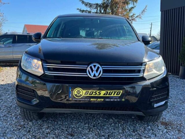 Чорний Фольксваген Тігуан, об'ємом двигуна 2 л та пробігом 142 тис. км за 12200 $, фото 2 на Automoto.ua