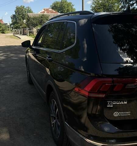 Черный Фольксваген Тигуан, объемом двигателя 1.98 л и пробегом 175 тыс. км за 17500 $, фото 2 на Automoto.ua