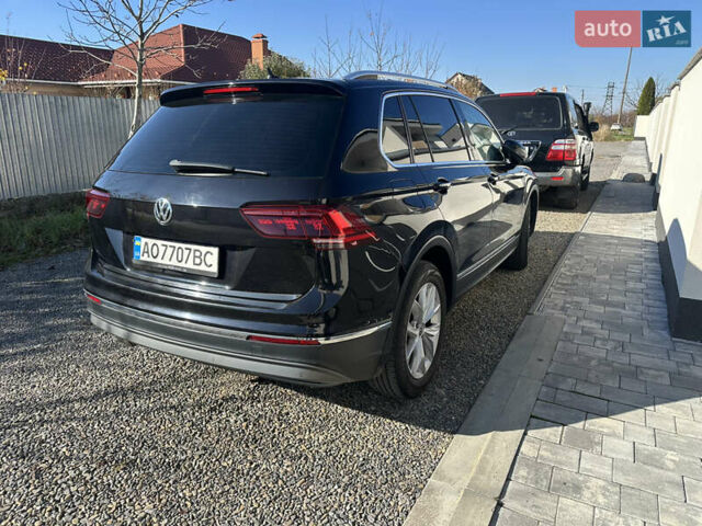 Черный Фольксваген Тигуан, объемом двигателя 1.97 л и пробегом 235 тыс. км за 21000 $, фото 3 на Automoto.ua