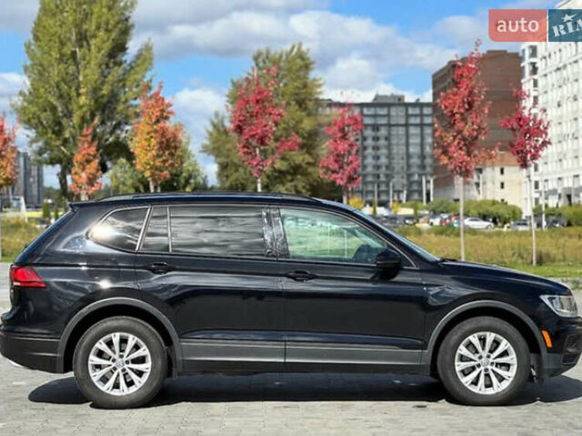 Чорний Фольксваген Тігуан, об'ємом двигуна 1.98 л та пробігом 155 тис. км за 13700 $, фото 4 на Automoto.ua