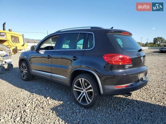 Черный Фольксваген Тигуан, объемом двигателя 2 л и пробегом 80 тыс. км за 1100 $, фото 1 на Automoto.ua