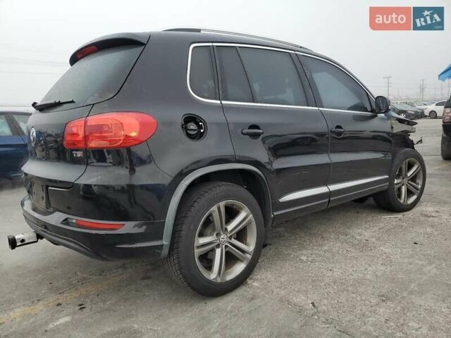 Черный Фольксваген Тигуан, объемом двигателя 1.98 л и пробегом 65 тыс. км за 650 $, фото 2 на Automoto.ua