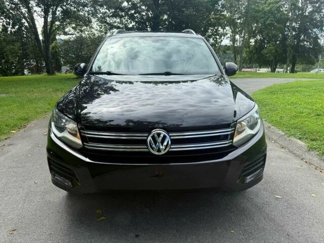 Чорний Фольксваген Тігуан, об'ємом двигуна 2 л та пробігом 52 тис. км за 3200 $, фото 1 на Automoto.ua