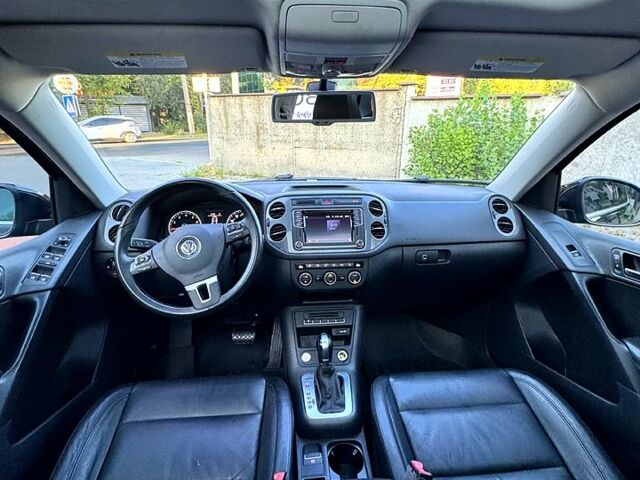 Черный Фольксваген Тигуан, объемом двигателя 2 л и пробегом 124 тыс. км за 16000 $, фото 2 на Automoto.ua