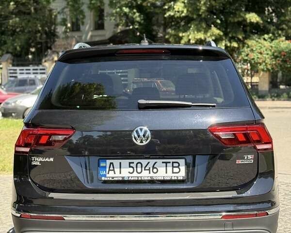 Черный Фольксваген Тигуан, объемом двигателя 2 л и пробегом 145 тыс. км за 19700 $, фото 3 на Automoto.ua