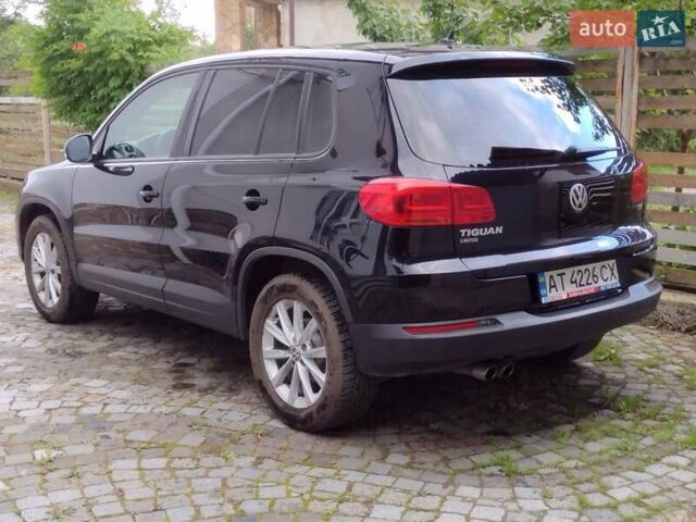 Черный Фольксваген Тигуан, объемом двигателя 2 л и пробегом 35 тыс. км за 19000 $, фото 2 на Automoto.ua
