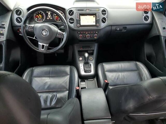 Черный Фольксваген Тигуан, объемом двигателя 1.98 л и пробегом 65 тыс. км за 650 $, фото 7 на Automoto.ua