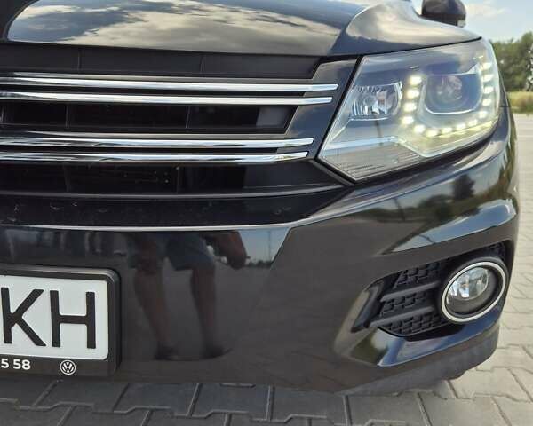 Чорний Фольксваген Тігуан, об'ємом двигуна 1.98 л та пробігом 117 тис. км за 17890 $, фото 4 на Automoto.ua