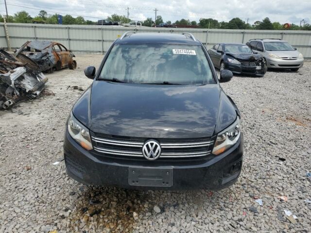 Черный Фольксваген Тигуан, объемом двигателя 2 л и пробегом 148 тыс. км за 9800 $, фото 1 на Automoto.ua