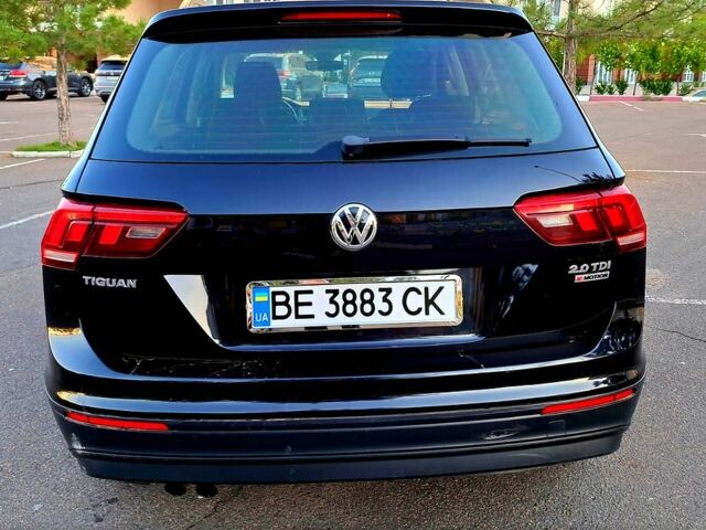 Черный Фольксваген Тигуан, объемом двигателя 2 л и пробегом 177 тыс. км за 20500 $, фото 2 на Automoto.ua