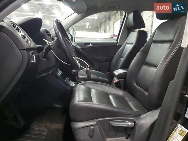 Чорний Фольксваген Тігуан, об'ємом двигуна 1.98 л та пробігом 138 тис. км за 1900 $, фото 7 на Automoto.ua