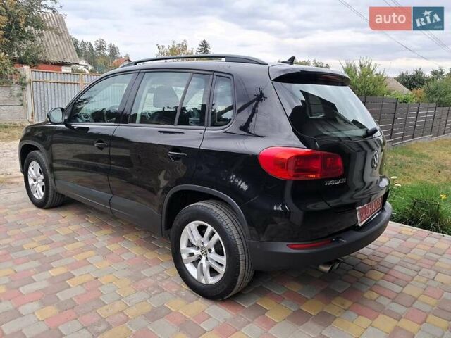 Чорний Фольксваген Тігуан, об'ємом двигуна 1.98 л та пробігом 143 тис. км за 12999 $, фото 2 на Automoto.ua