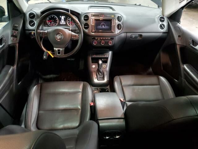 Чорний Фольксваген Тігуан, об'ємом двигуна 2 л та пробігом 182 тис. км за 8900 $, фото 7 на Automoto.ua