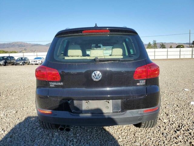 Черный Фольксваген Тигуан, объемом двигателя 2 л и пробегом 80 тыс. км за 2000 $, фото 5 на Automoto.ua