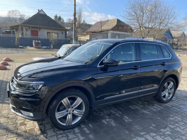 Черный Фольксваген Тигуан, объемом двигателя 2 л и пробегом 225 тыс. км за 24000 $, фото 3 на Automoto.ua