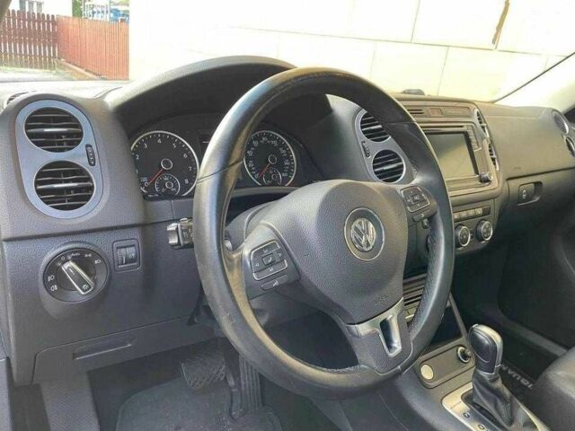 Чорний Фольксваген Тігуан, об'ємом двигуна 2 л та пробігом 153 тис. км за 12000 $, фото 5 на Automoto.ua