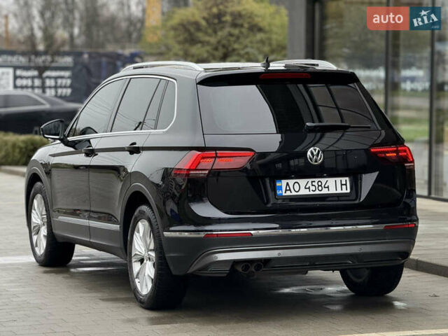 Черный Фольксваген Тигуан, объемом двигателя 2 л и пробегом 209 тыс. км за 23800 $, фото 7 на Automoto.ua