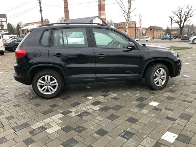 Чорний Фольксваген Тігуан, об'ємом двигуна 2 л та пробігом 187 тис. км за 10900 $, фото 2 на Automoto.ua