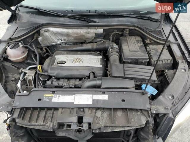 Черный Фольксваген Тигуан, объемом двигателя 1.98 л и пробегом 65 тыс. км за 650 $, фото 11 на Automoto.ua