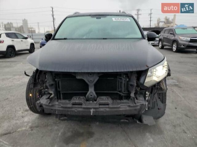 Черный Фольксваген Тигуан, объемом двигателя 1.98 л и пробегом 65 тыс. км за 650 $, фото 4 на Automoto.ua