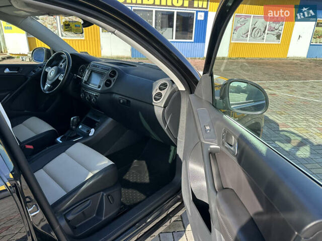 Черный Фольксваген Тигуан, объемом двигателя 2 л и пробегом 100 тыс. км за 14200 $, фото 27 на Automoto.ua