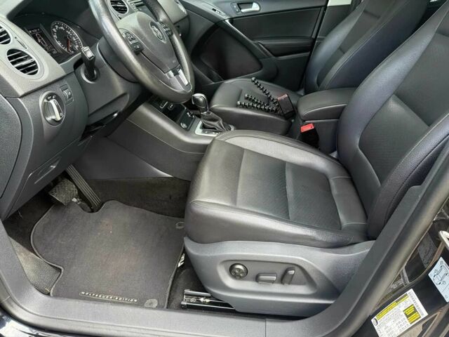 Чорний Фольксваген Тігуан, об'ємом двигуна 2 л та пробігом 52 тис. км за 3200 $, фото 7 на Automoto.ua