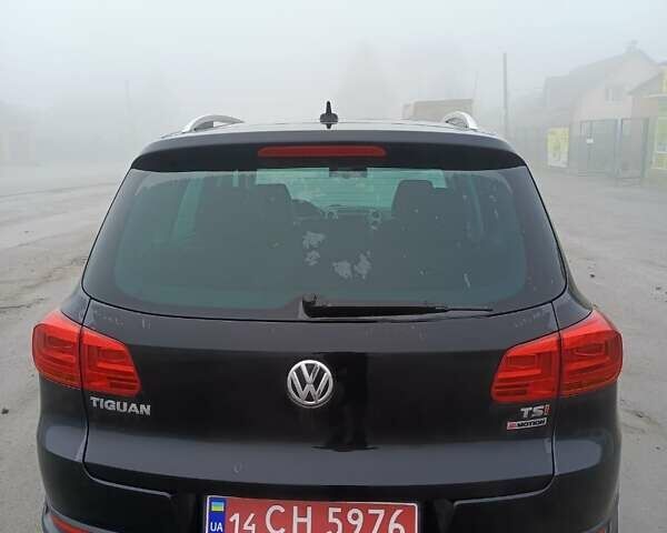 Черный Фольксваген Тигуан, объемом двигателя 1.98 л и пробегом 120 тыс. км за 14700 $, фото 1 на Automoto.ua