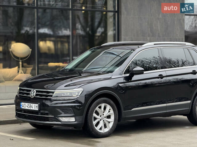 Черный Фольксваген Тигуан, объемом двигателя 2 л и пробегом 209 тыс. км за 23800 $, фото 5 на Automoto.ua
