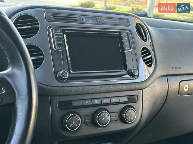 Черный Фольксваген Тигуан, объемом двигателя 2 л и пробегом 100 тыс. км за 14200 $, фото 62 на Automoto.ua