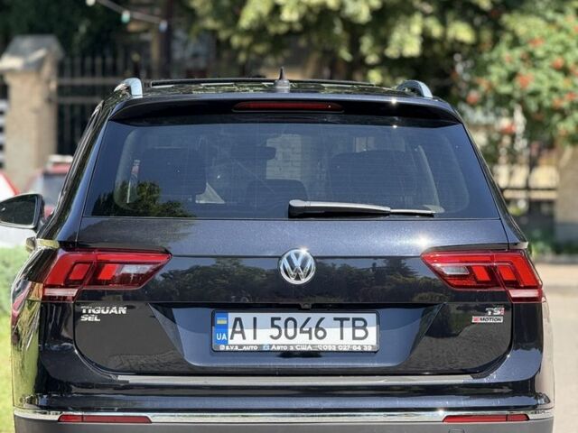 Черный Фольксваген Тигуан, объемом двигателя 2 л и пробегом 145 тыс. км за 19700 $, фото 2 на Automoto.ua