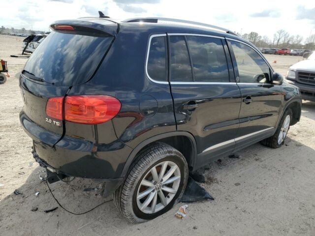 Чорний Фольксваген Тігуан, об'ємом двигуна 2 л та пробігом 150 тис. км за 8600 $, фото 5 на Automoto.ua