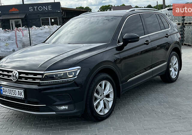 Черный Фольксваген Тигуан, объемом двигателя 1.97 л и пробегом 250 тыс. км за 23500 $, фото 2 на Automoto.ua