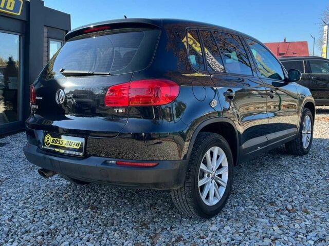 Чорний Фольксваген Тігуан, об'ємом двигуна 2 л та пробігом 142 тис. км за 12200 $, фото 4 на Automoto.ua