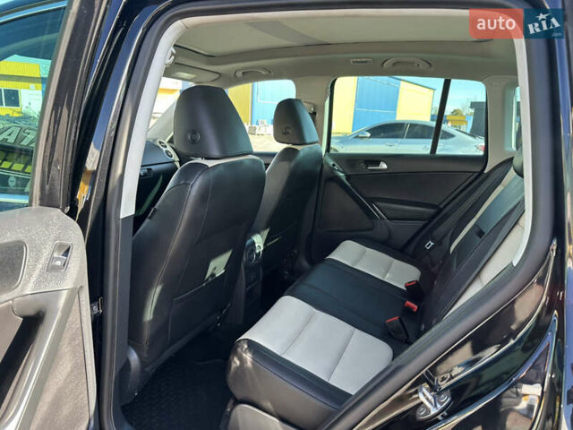 Черный Фольксваген Тигуан, объемом двигателя 2 л и пробегом 100 тыс. км за 13950 $, фото 19 на Automoto.ua