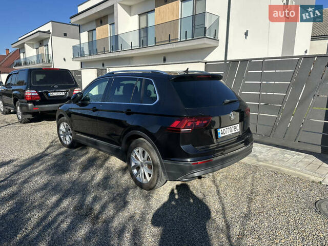 Черный Фольксваген Тигуан, объемом двигателя 1.97 л и пробегом 235 тыс. км за 21000 $, фото 2 на Automoto.ua