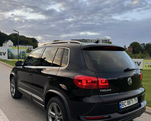 Чорний Фольксваген Тігуан, об'ємом двигуна 2 л та пробігом 117 тис. км за 15800 $, фото 1 на Automoto.ua