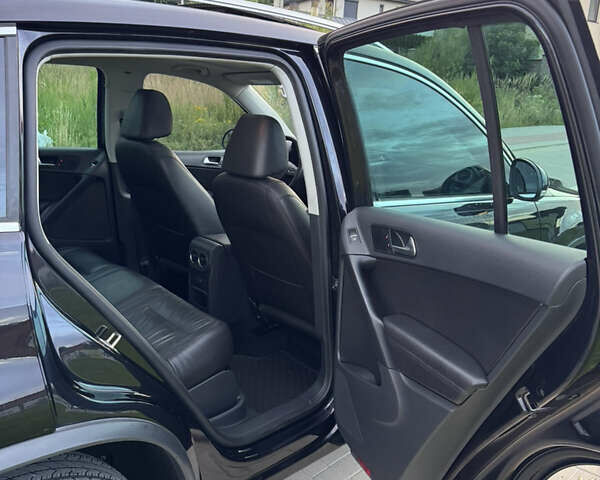 Чорний Фольксваген Тігуан, об'ємом двигуна 2 л та пробігом 117 тис. км за 15800 $, фото 16 на Automoto.ua