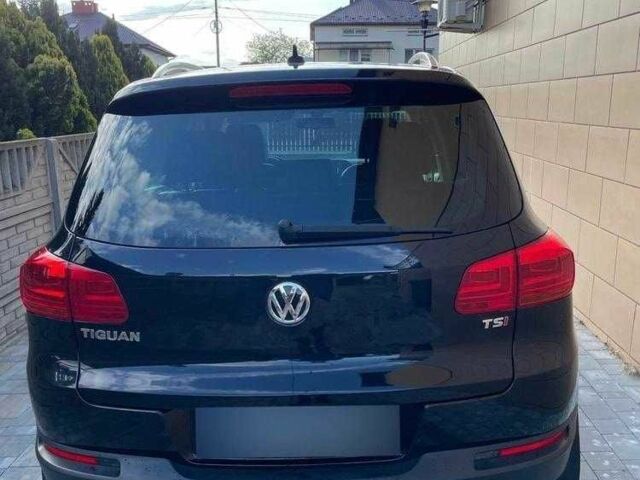 Чорний Фольксваген Тігуан, об'ємом двигуна 2 л та пробігом 153 тис. км за 12000 $, фото 4 на Automoto.ua