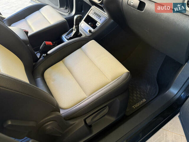 Черный Фольксваген Тигуан, объемом двигателя 1.98 л и пробегом 161 тыс. км за 14300 $, фото 21 на Automoto.ua