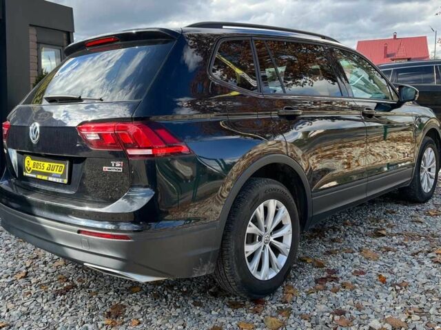 Чорний Фольксваген Тігуан, об'ємом двигуна 2 л та пробігом 42 тис. км за 17000 $, фото 4 на Automoto.ua