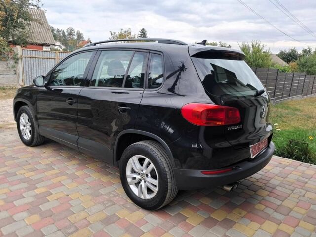 Черный Фольксваген Тигуан, объемом двигателя 2 л и пробегом 143 тыс. км за 12999 $, фото 2 на Automoto.ua