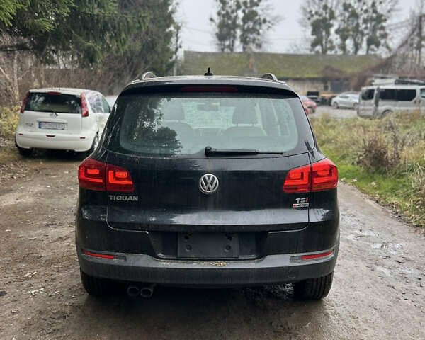 Черный Фольксваген Тигуан, объемом двигателя 1.98 л и пробегом 198 тыс. км за 8800 $, фото 6 на Automoto.ua