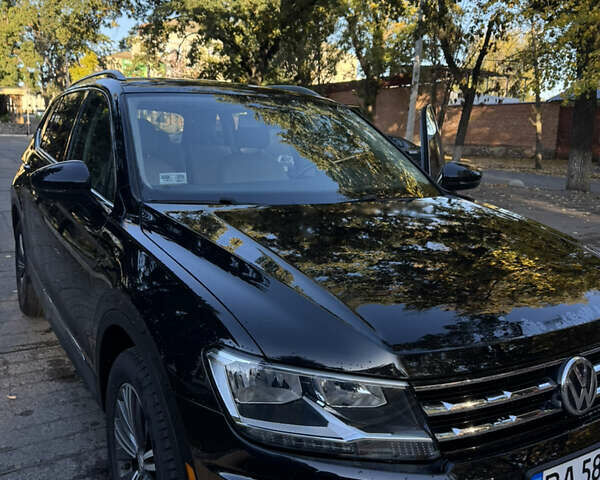 Чорний Фольксваген Тігуан, об'ємом двигуна 1.98 л та пробігом 127 тис. км за 22000 $, фото 1 на Automoto.ua