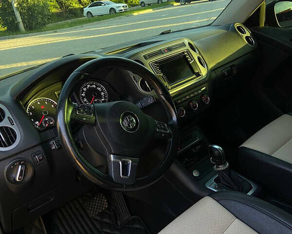 Чорний Фольксваген Тігуан, об'ємом двигуна 1.98 л та пробігом 145 тис. км за 13400 $, фото 10 на Automoto.ua