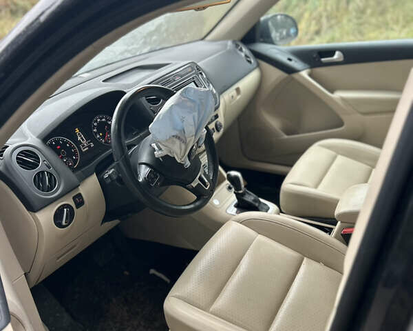 Черный Фольксваген Тигуан, объемом двигателя 1.98 л и пробегом 198 тыс. км за 8800 $, фото 7 на Automoto.ua