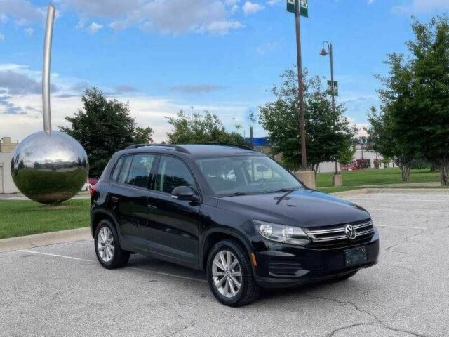 Чорний Фольксваген Тігуан, об'ємом двигуна 2 л та пробігом 123 тис. км за 3200 $, фото 2 на Automoto.ua