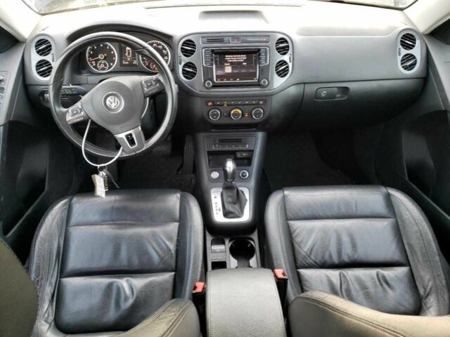 Черный Фольксваген Тигуан, объемом двигателя 2 л и пробегом 118 тыс. км за 2500 $, фото 7 на Automoto.ua